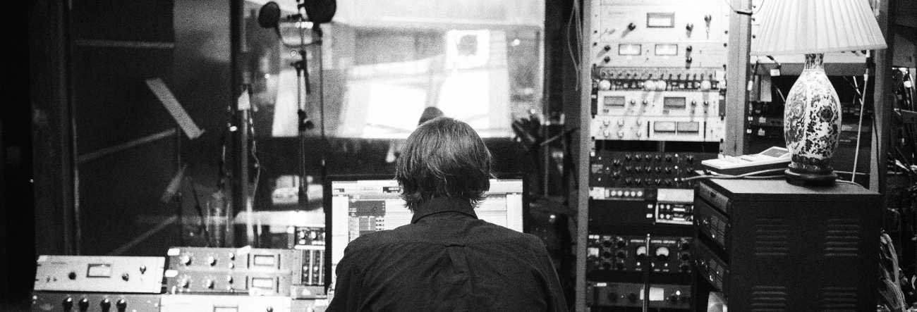 Sound engineer working in a music studio.